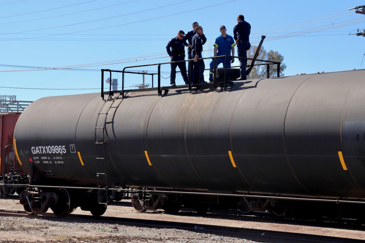 First Responders Standing on Train
